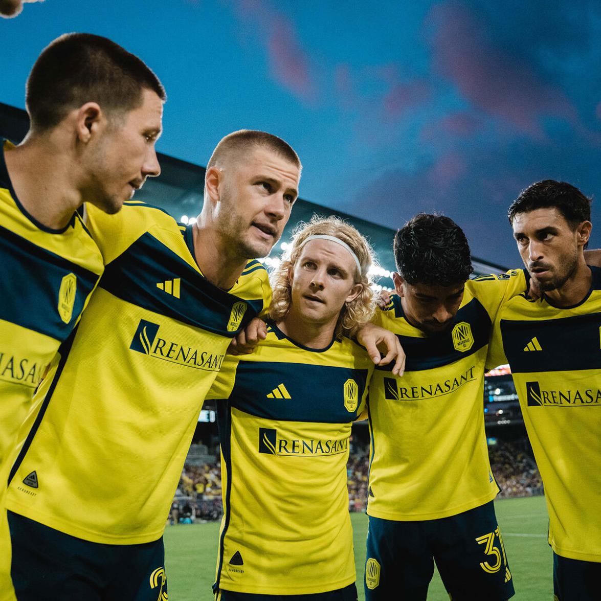 Nashville SC goalie diving for a goal shot
